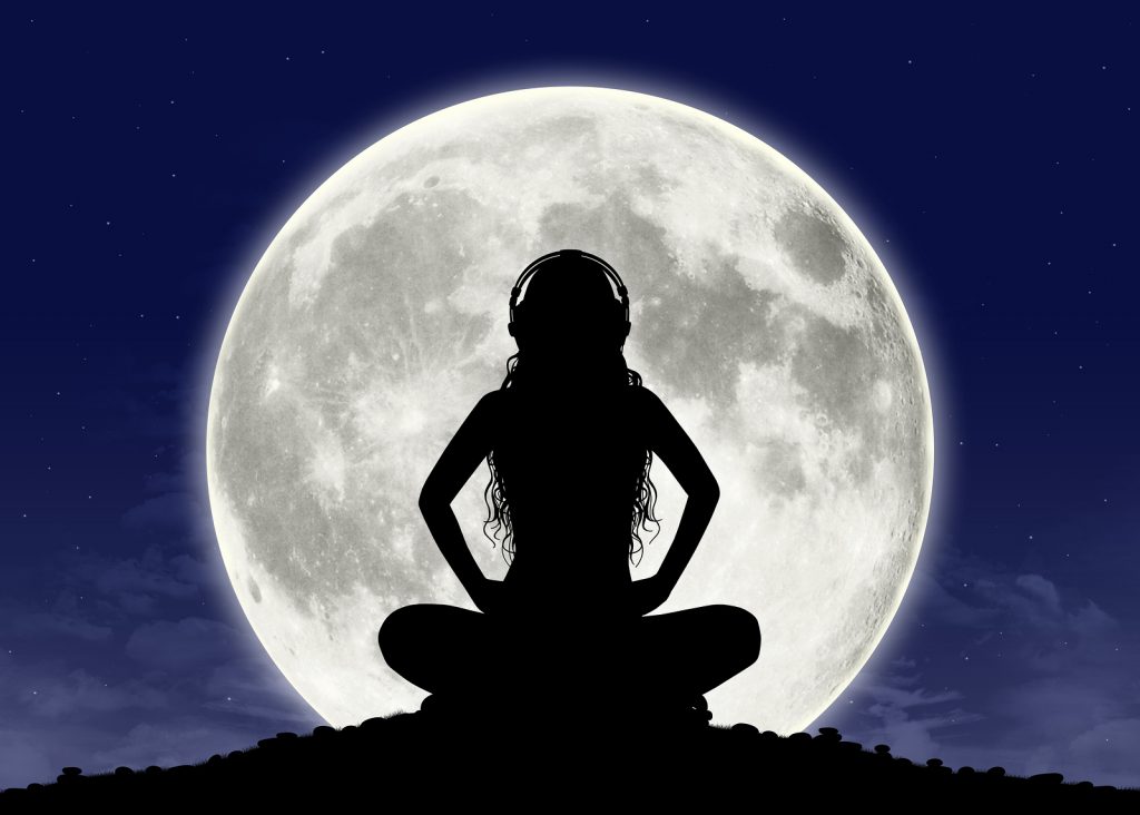 Young Woman Listening To The Music At The Full Moon